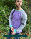 Organic cotton long sleeve shirt, lavender torso with grey geometric sleeves, front view on model.
