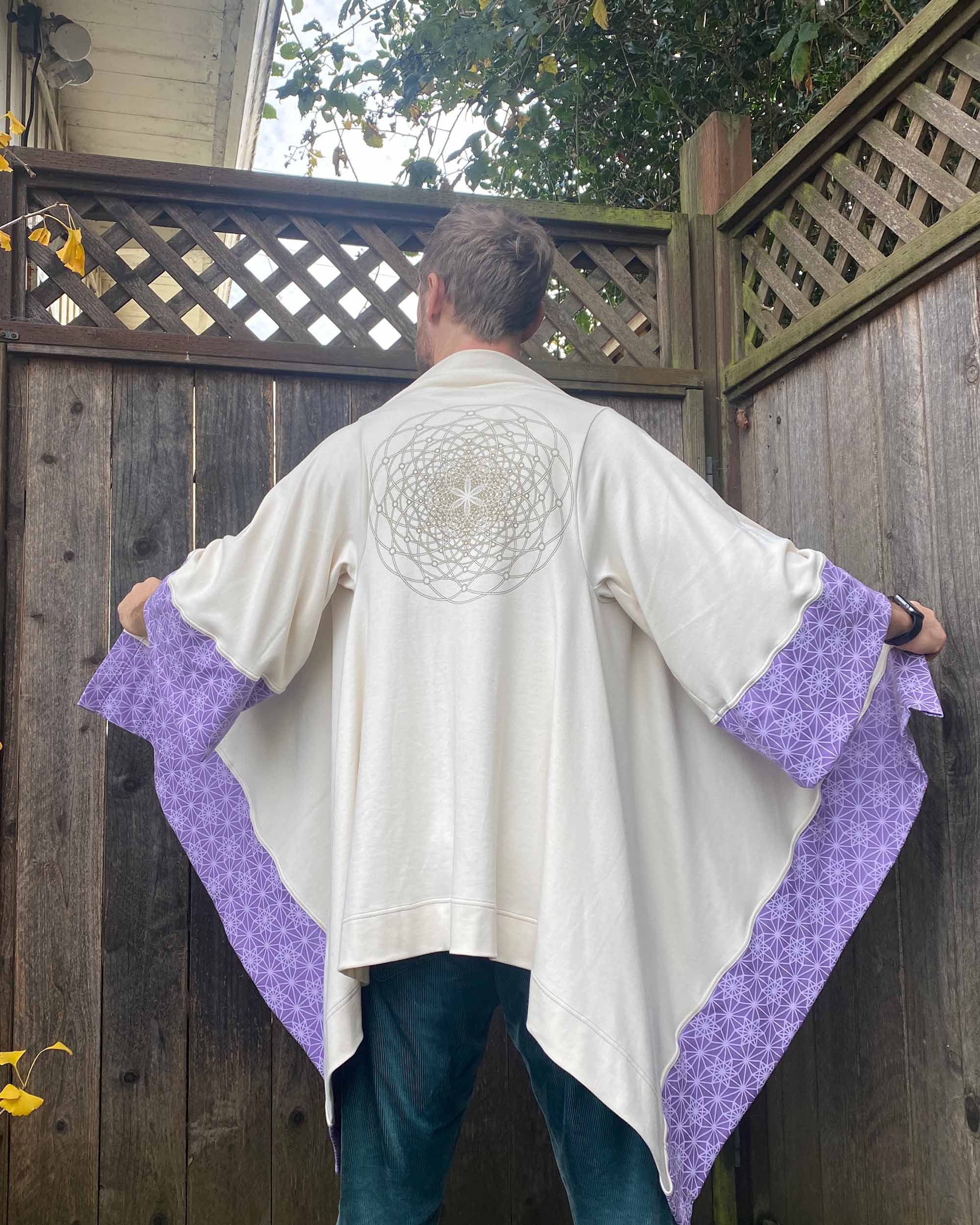 Organic cotton kimono, undyed with lavender geometric printed accent fabric with gold sacred geometry print.