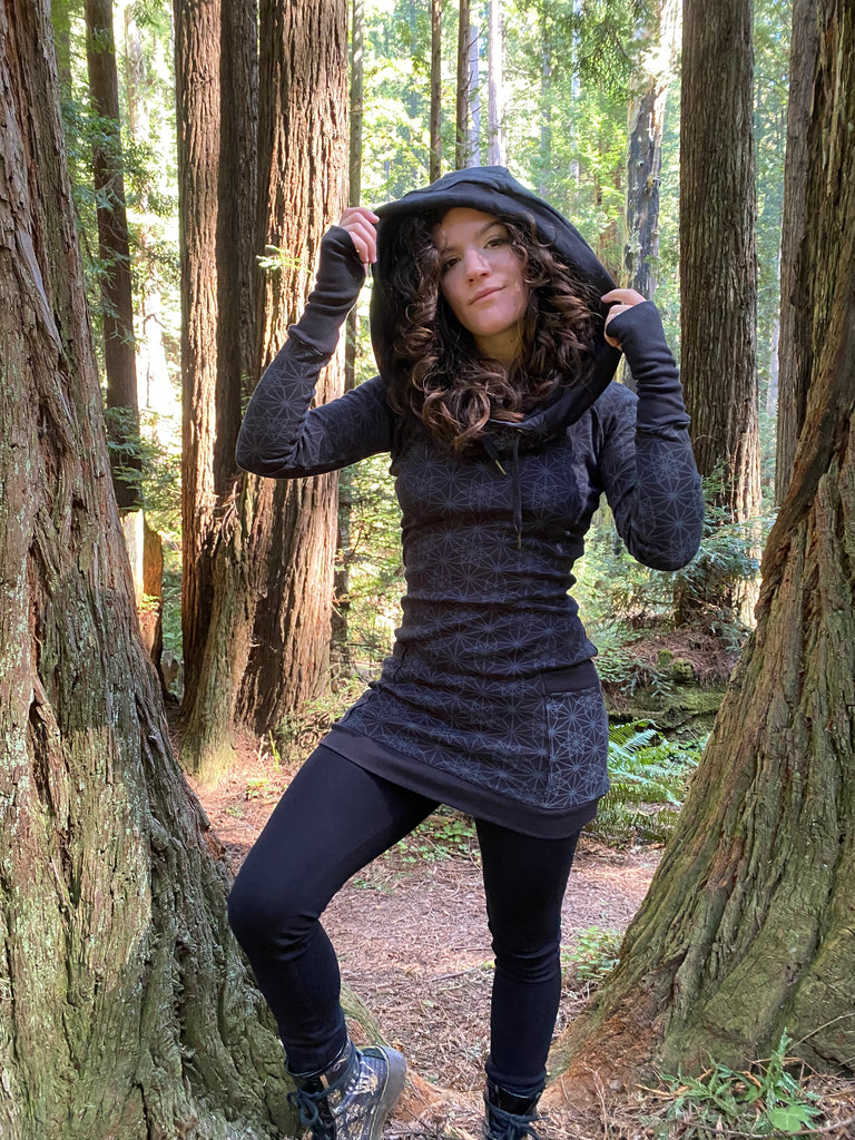 Women's long sleeve black festival hoodie dress with pockets made in the USA from organic cotton. Sacred geometry print.