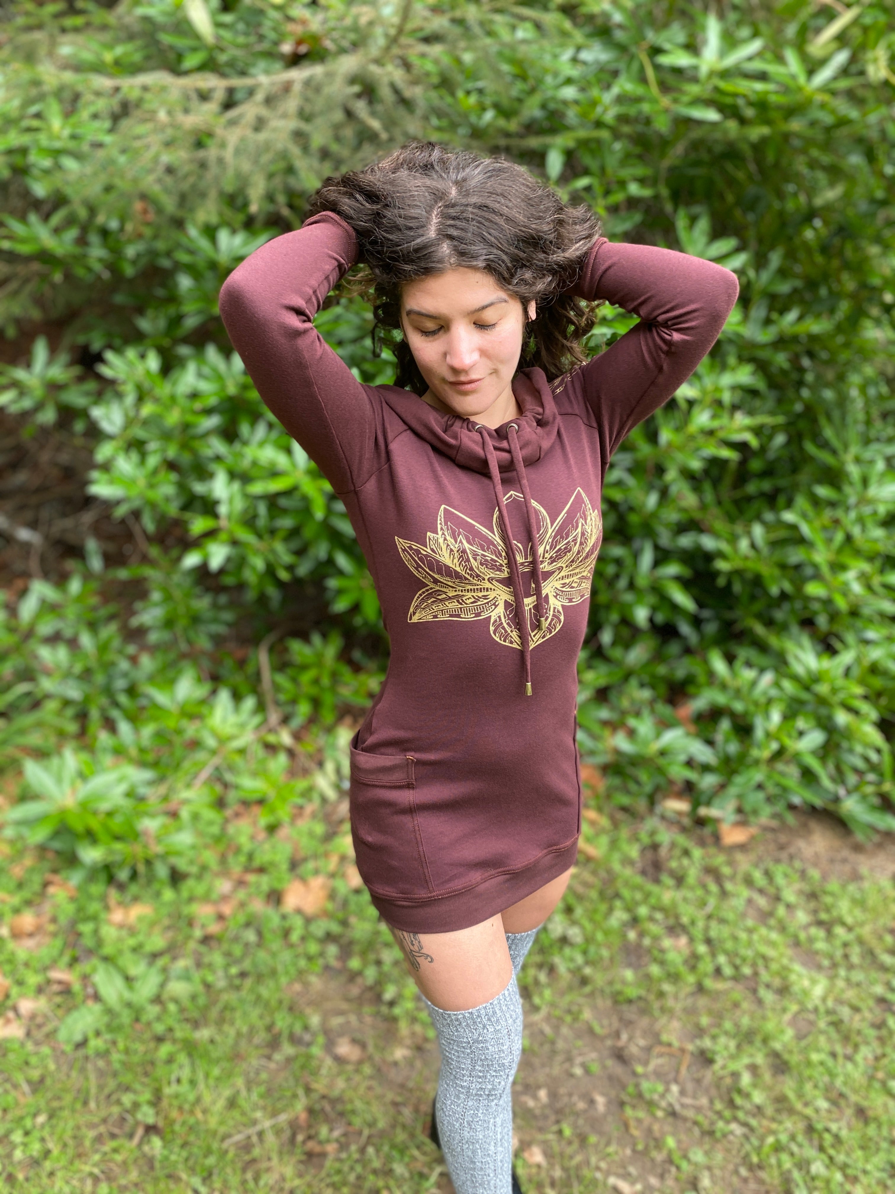 Women's long sleeve hoodie dress with pockets. Gold lotus flower. Deep hood with drawstrings. Festival wear made in the USA.