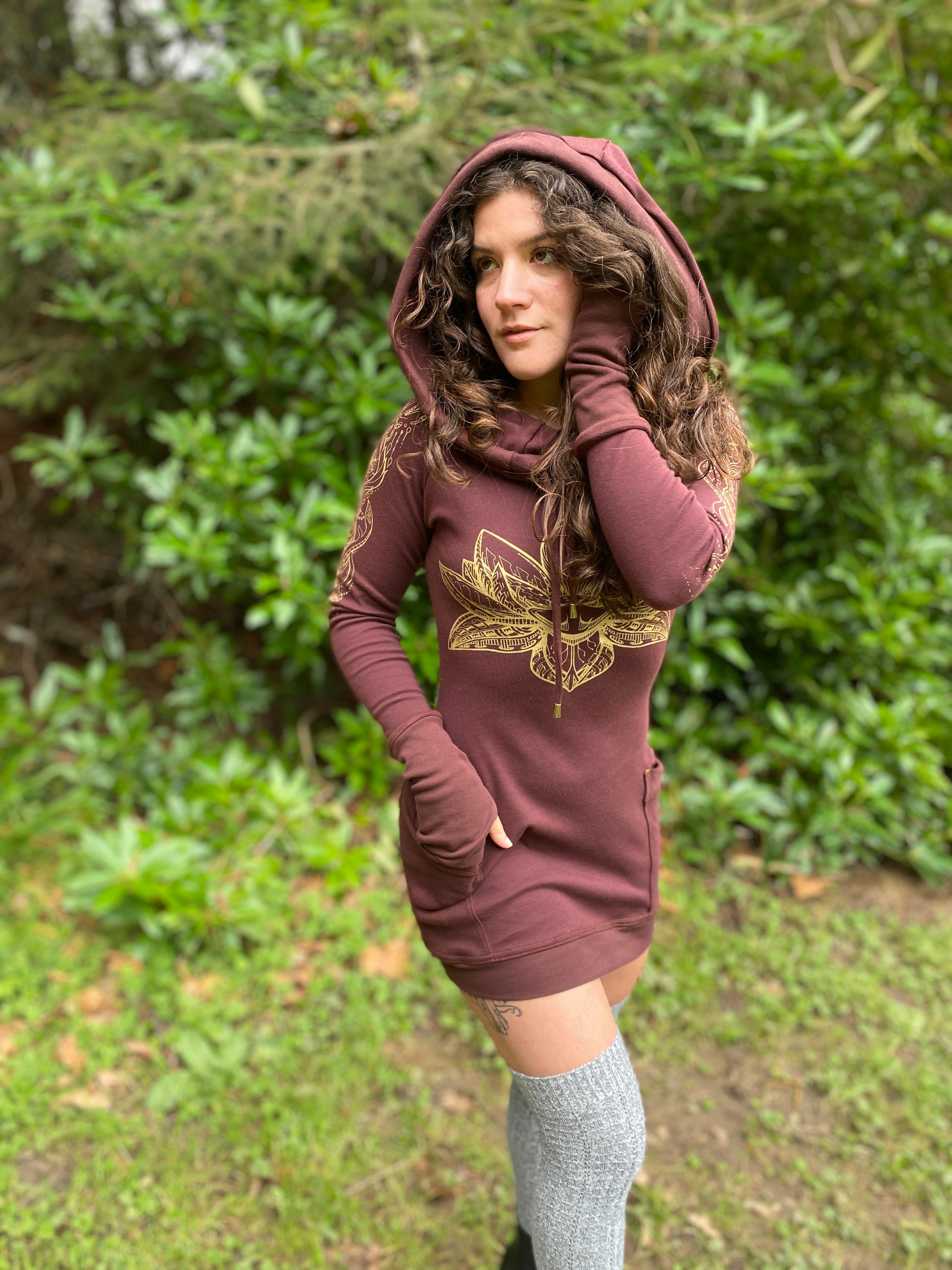 Women's long sleeve hoodie dress with pockets. Gold lotus flower. Deep hood with drawstrings. Festival wear made in the USA.