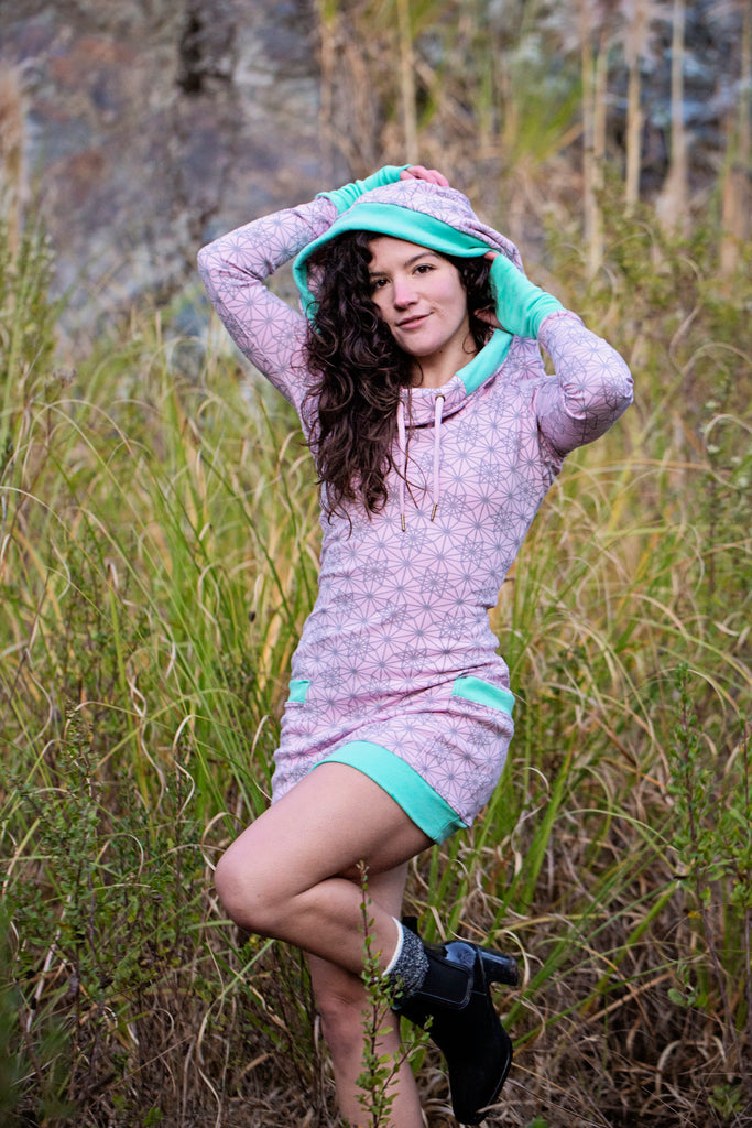 Pink hoodie dress with sacred geometry design. Deep drawstring hood. Festival wear made in the USA from organic cotton.