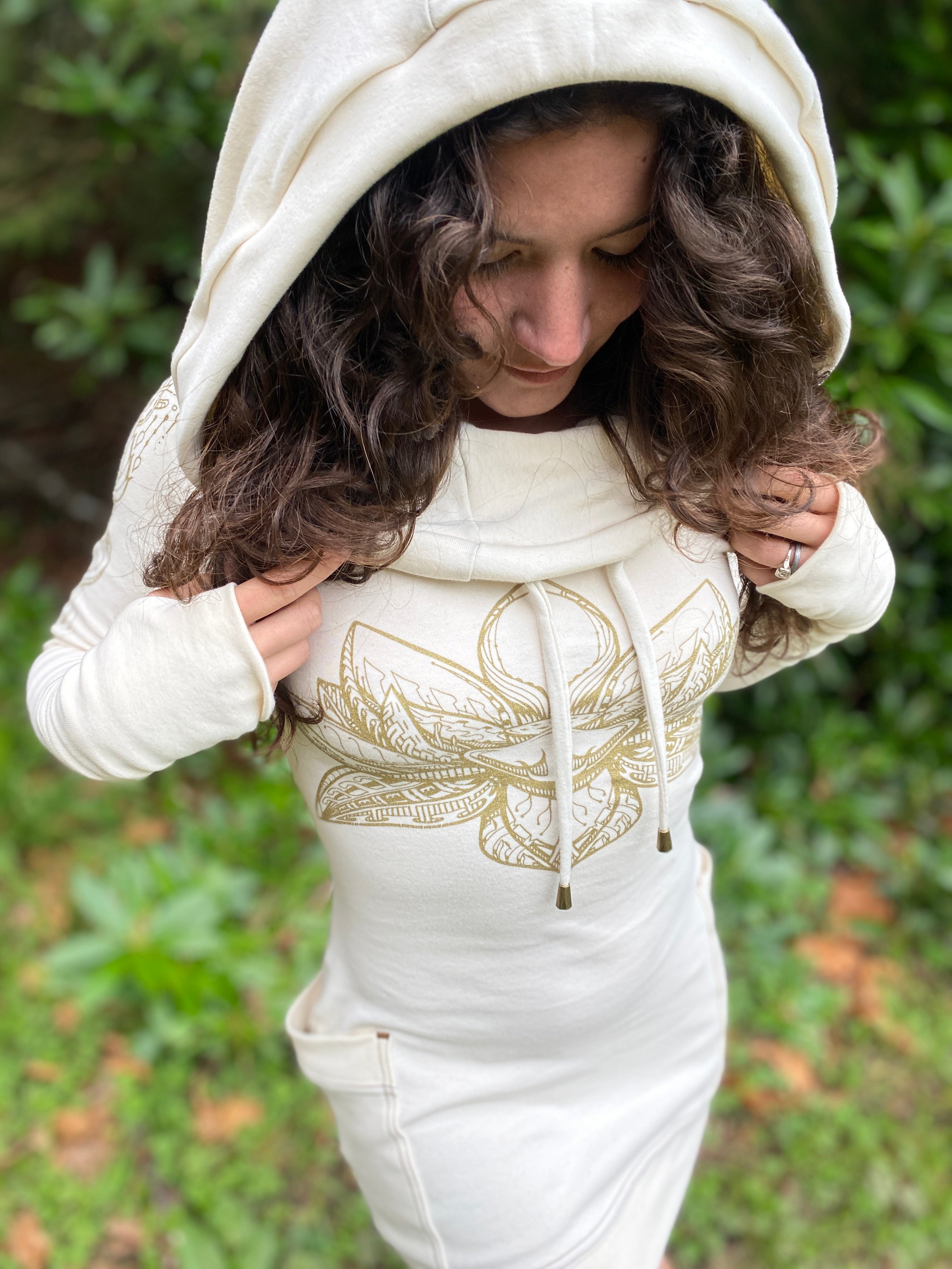 Women's organic cotton hooded dress with pockets made in the USA. Deep cowl lined hood with drawcord. Sacred geometry print.