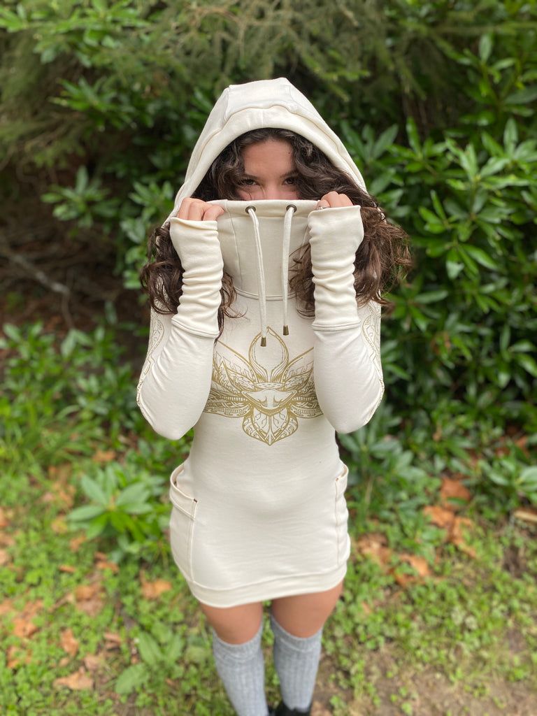 Women's organic cotton hooded dress with pockets made in the USA. Deep cowl lined hood with drawcord. Sacred geometry print.