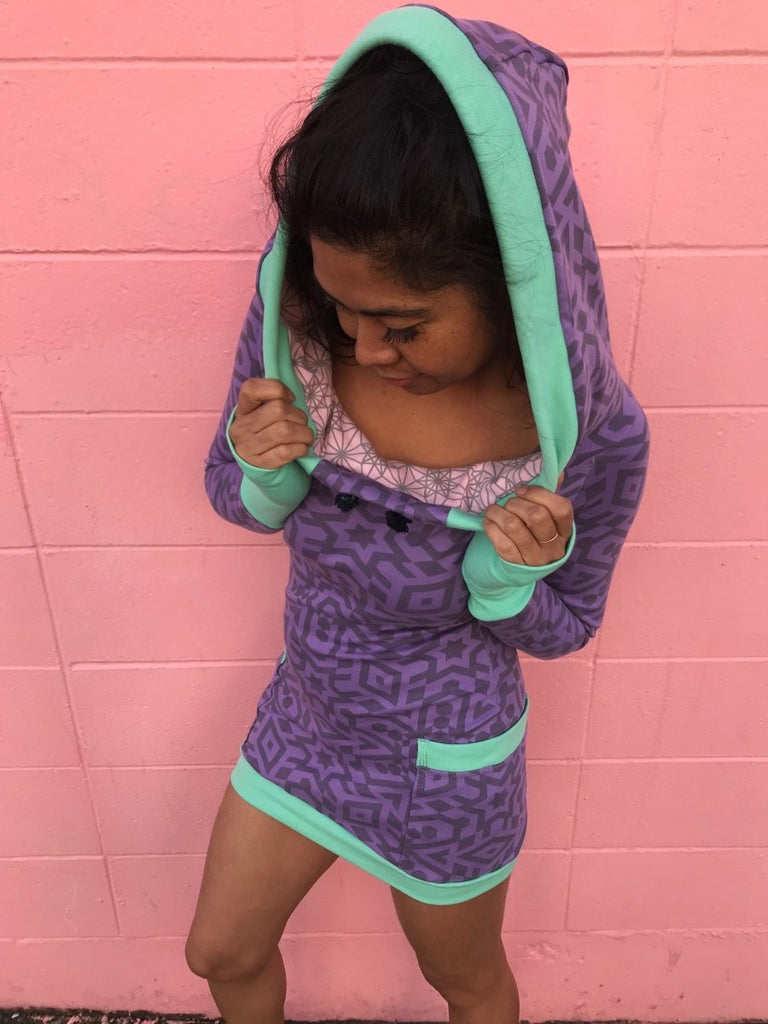 Women's long sleeve lavender pullover hoodie dress with pockets. Deep drawstring hood. Organic clothing made in the USA.